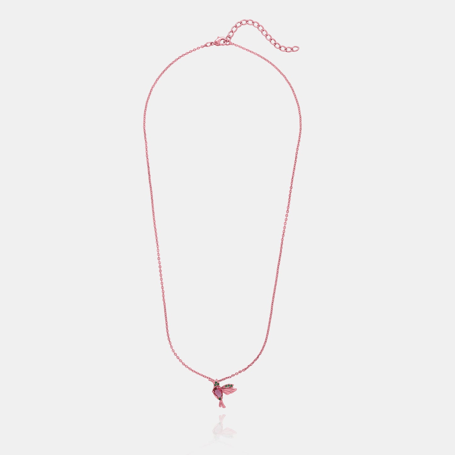 rose gold necklace with a pink bird pendant