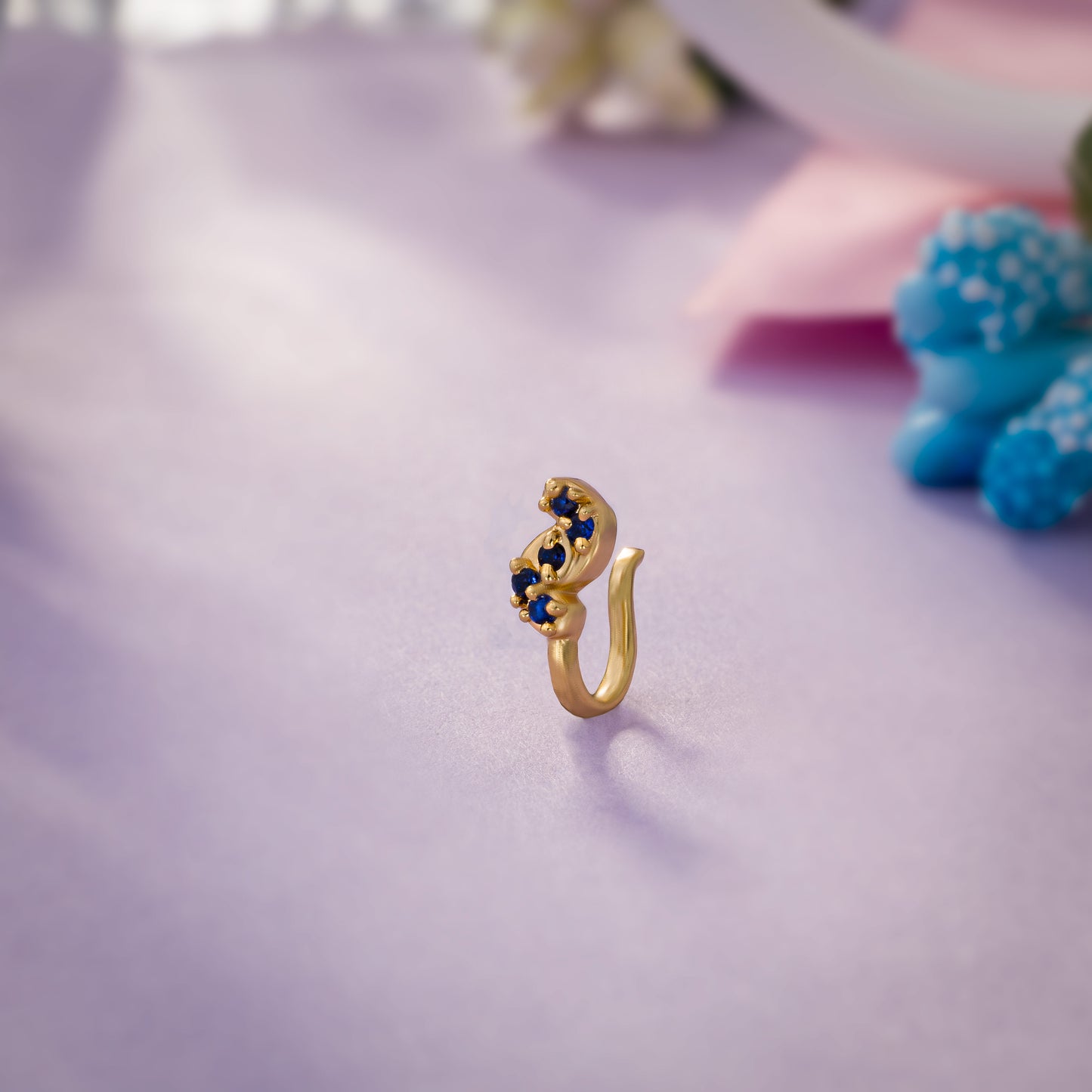 blue twirl sapphire nose pin