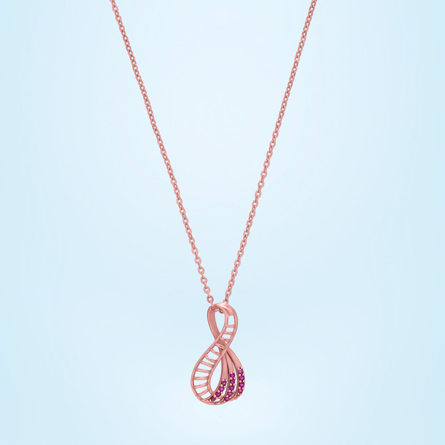 pink pendant with a rose gold necklace