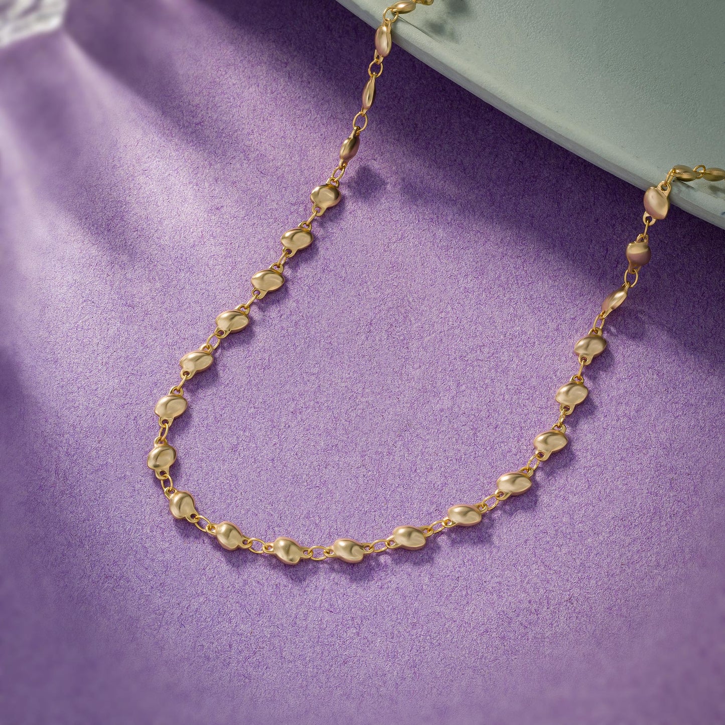 golden pebble chain