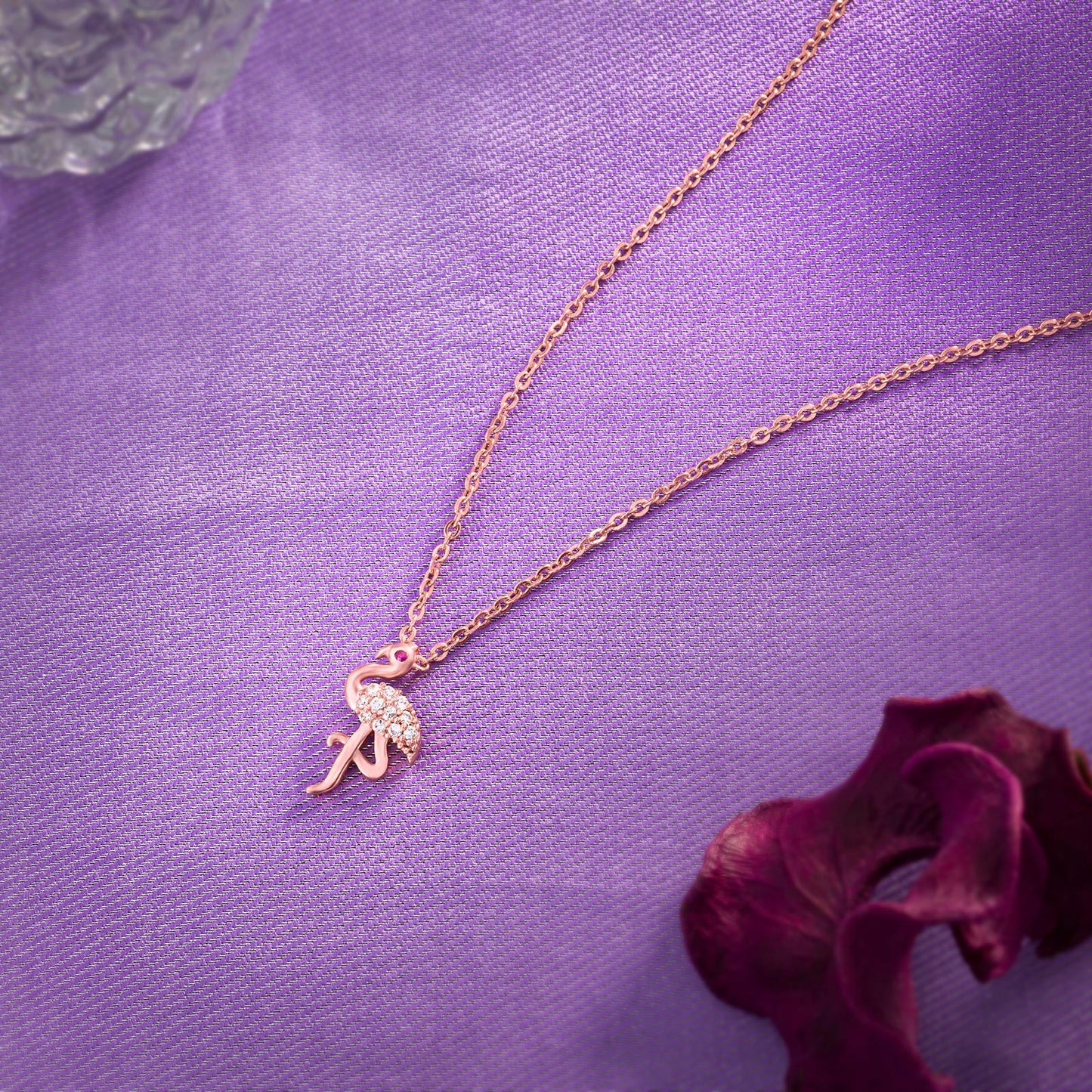 rose gold flaming necklace with a diamond heart