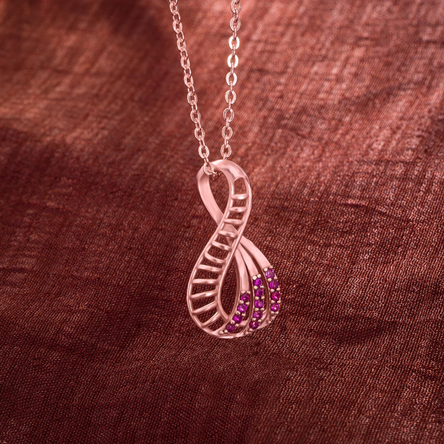 pink pendant with a rose gold necklace