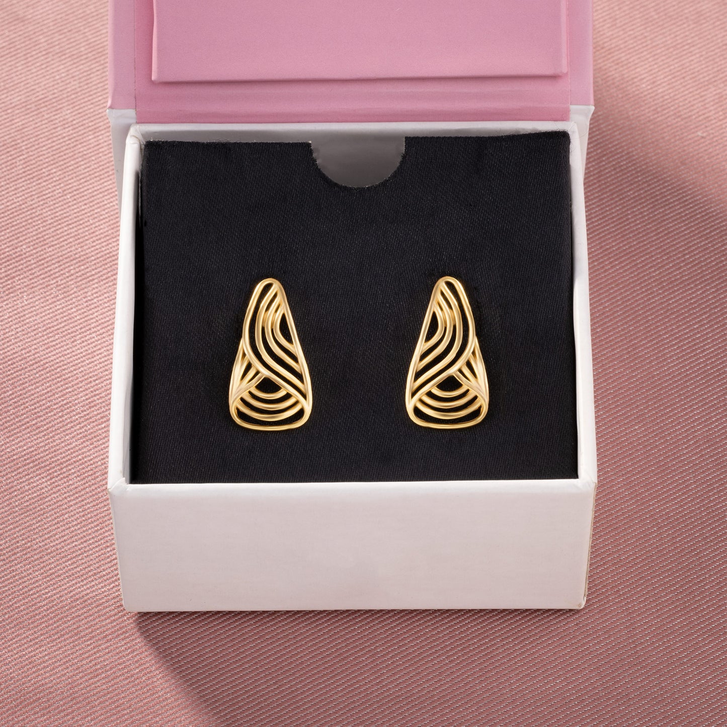 pair of golden earrings