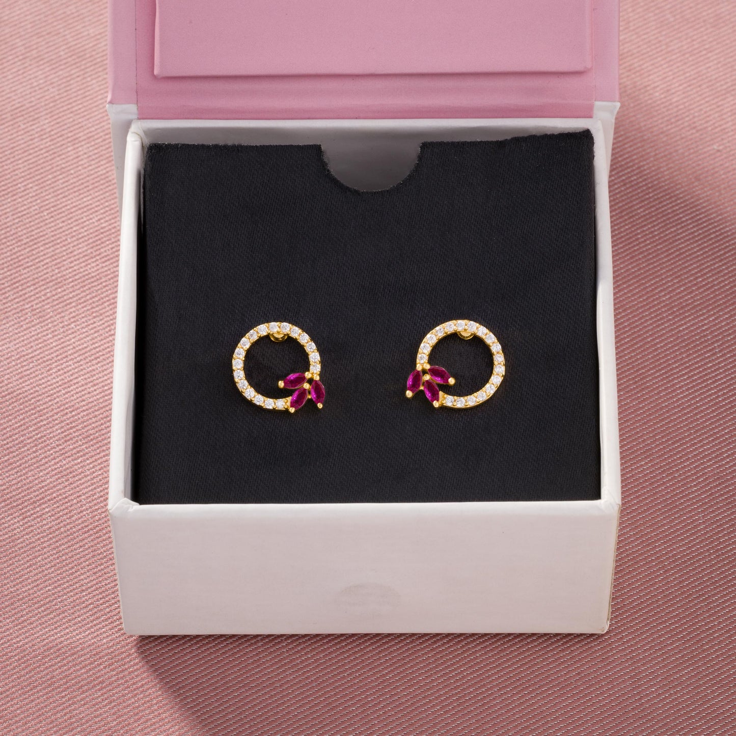 pair of golden and cubic earrings