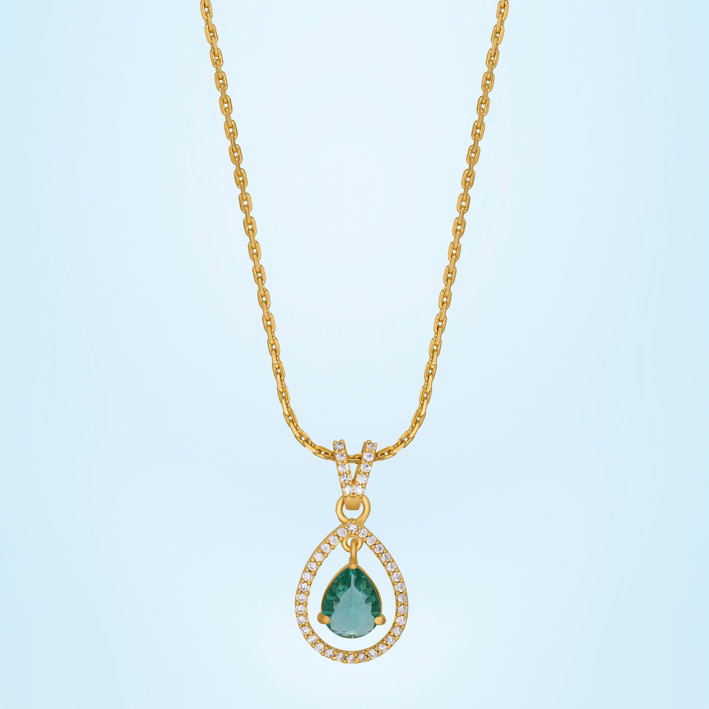 golden necklace with a stone and diamonds