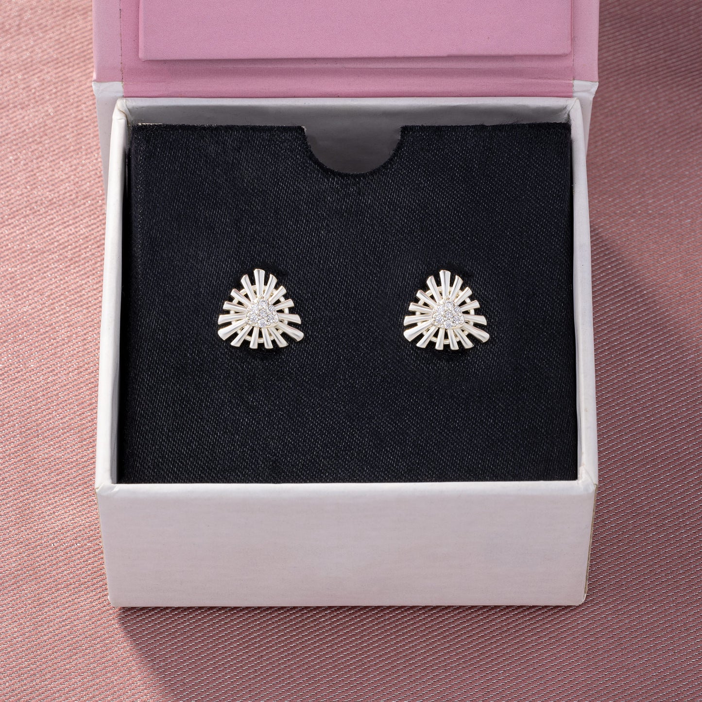 silver sunburst stud