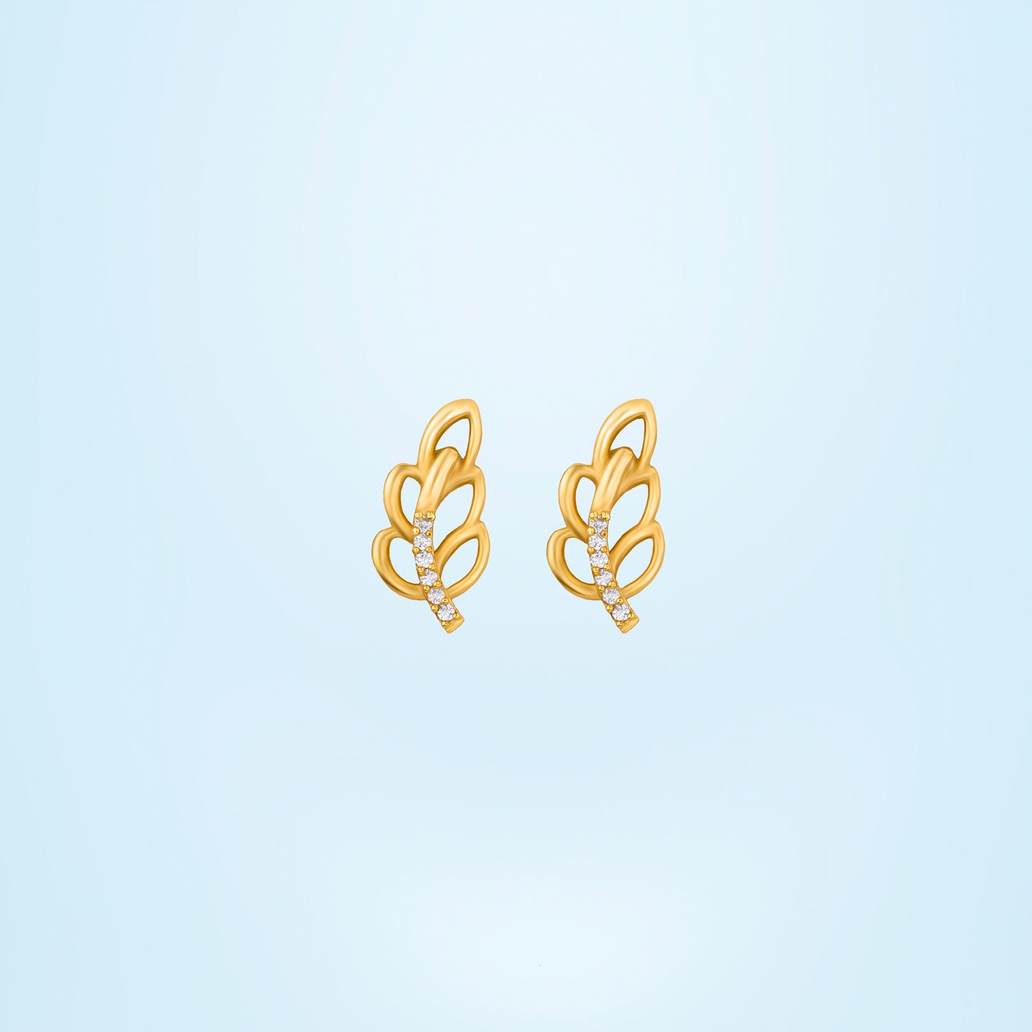 pair of golden earrings with a single diamond