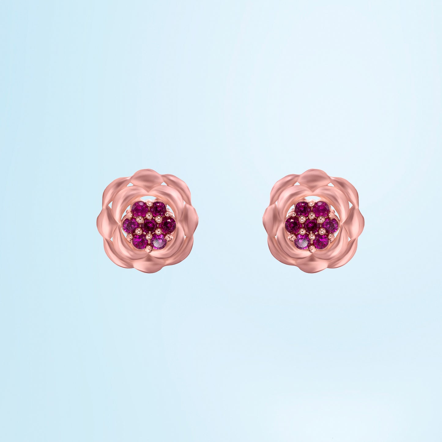 rose gold flower stud earrings with red diamonds