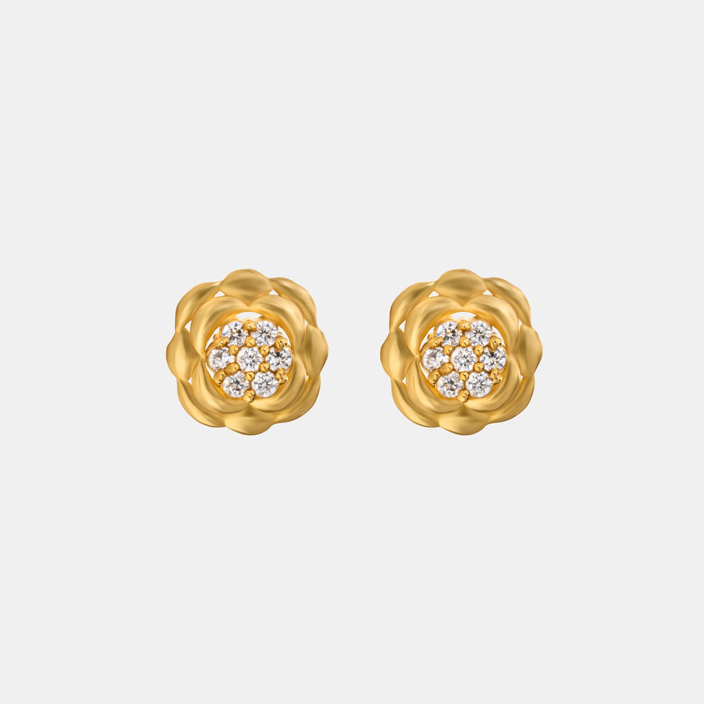 golden flower stud earrings with white diamonds