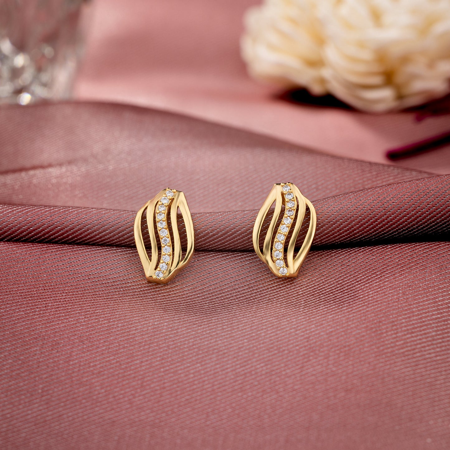 white golden wave earrings