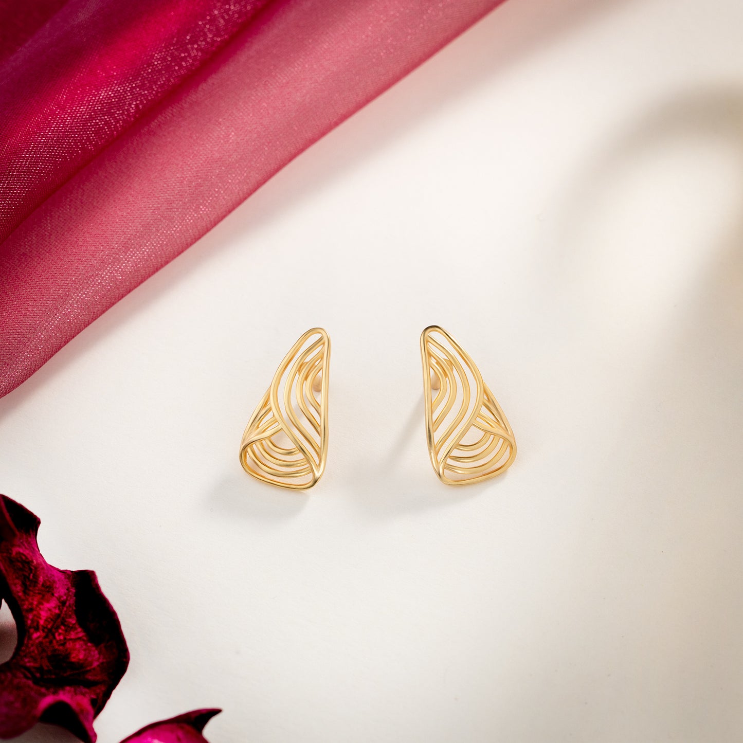 pair of golden earrings