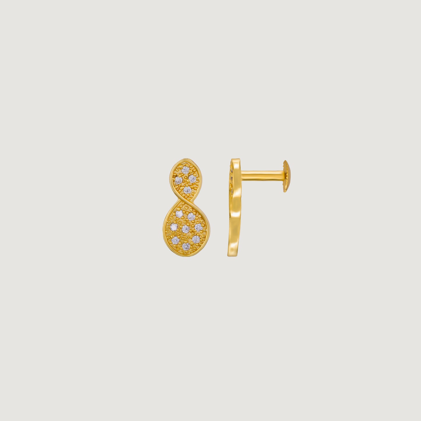 pair of golden earrings with diamonds