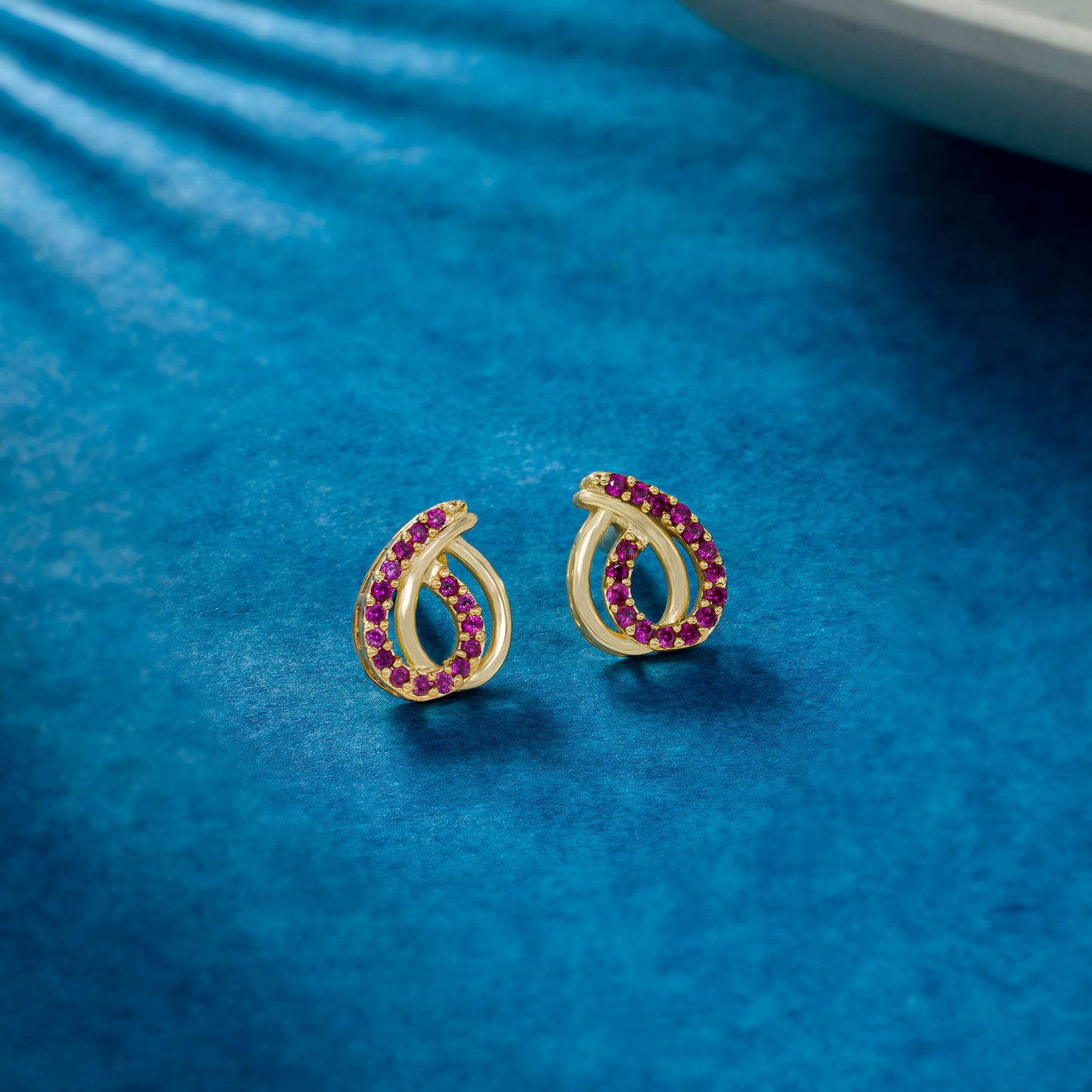 red elegant twisted earrings