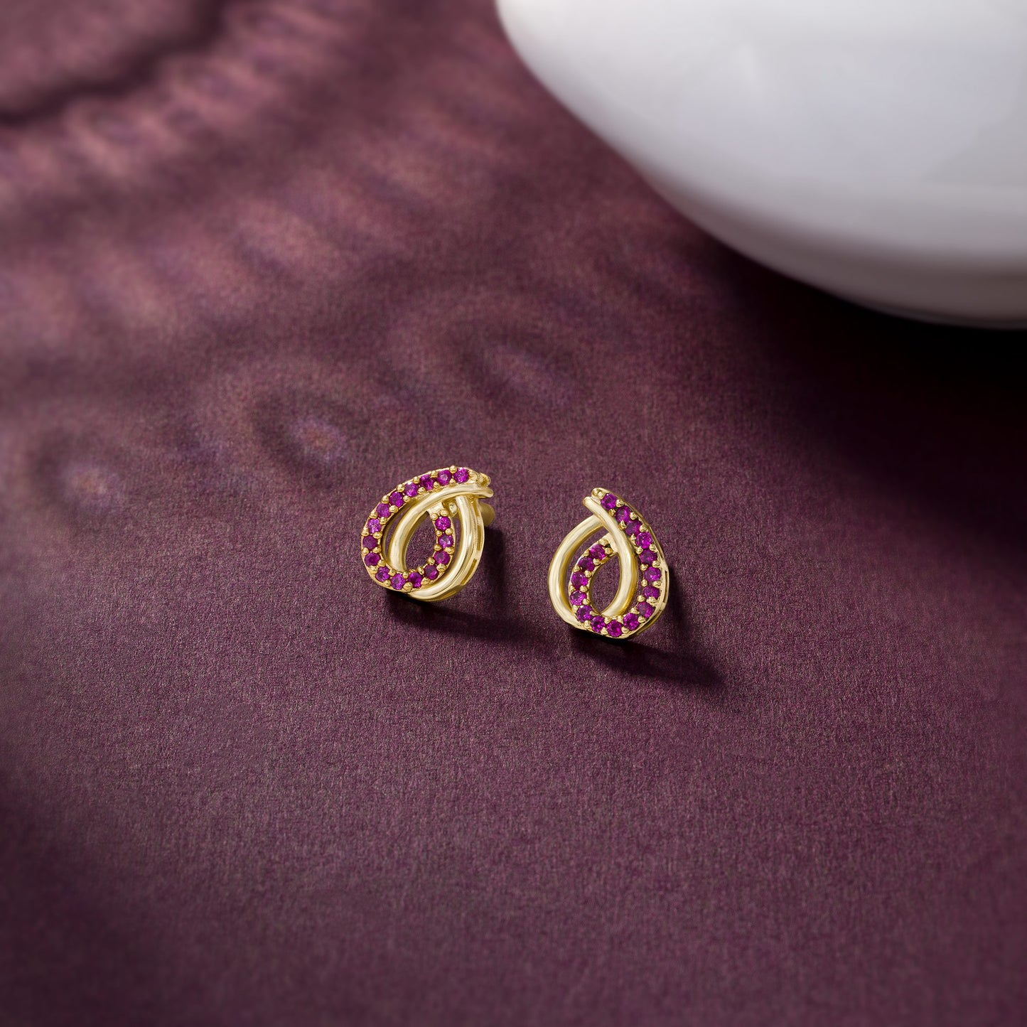 red elegant twisted earrings