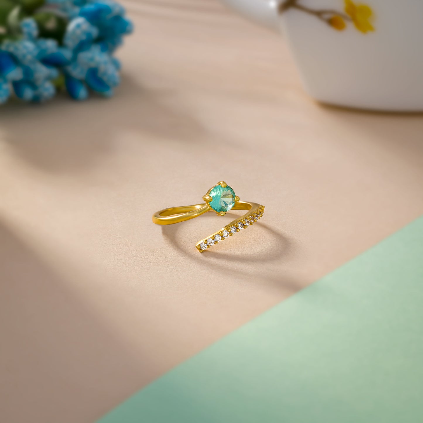 golden emerald and diamond ring