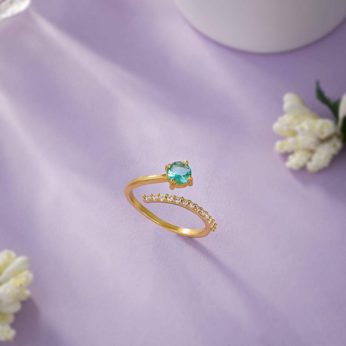 golden emerald and diamond ring