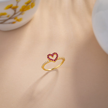 Golden Ring with a Heart Shaped Ruby Stone