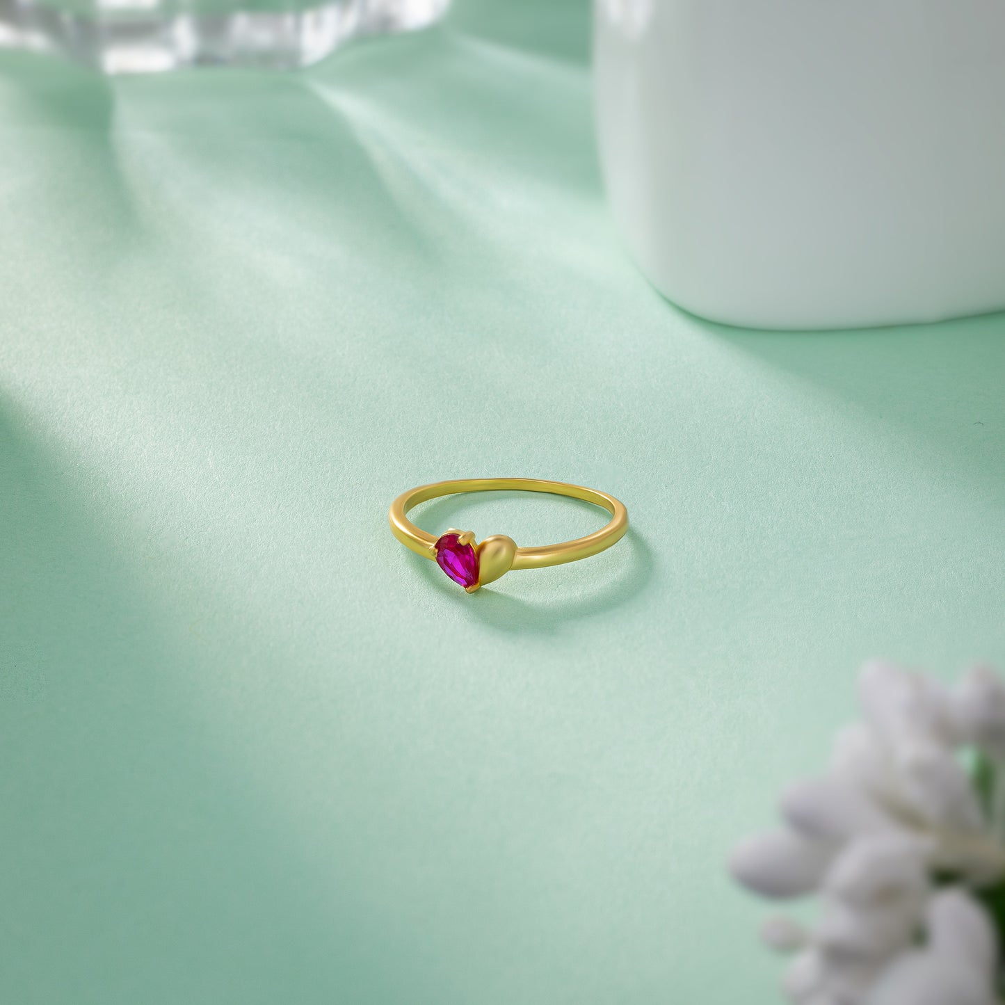 golden ring with a ruby stone