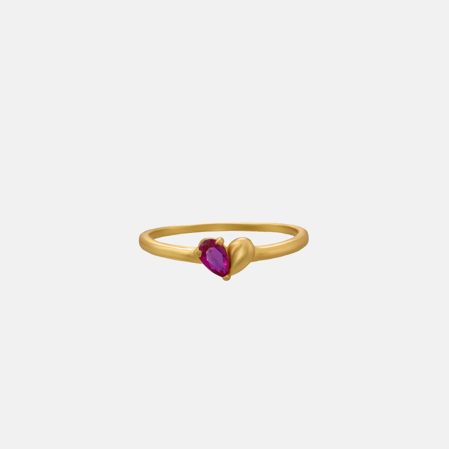 golden ring with a ruby stone