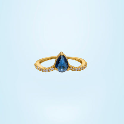 Golden Ring with a Blue Sapphire and Diamonds