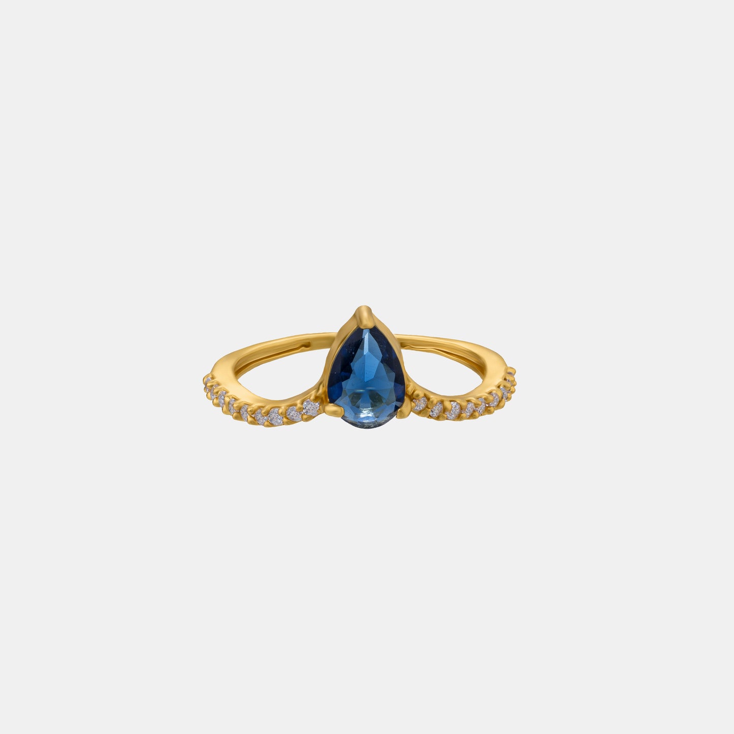 golden ring with a blue sapphire and diamonds