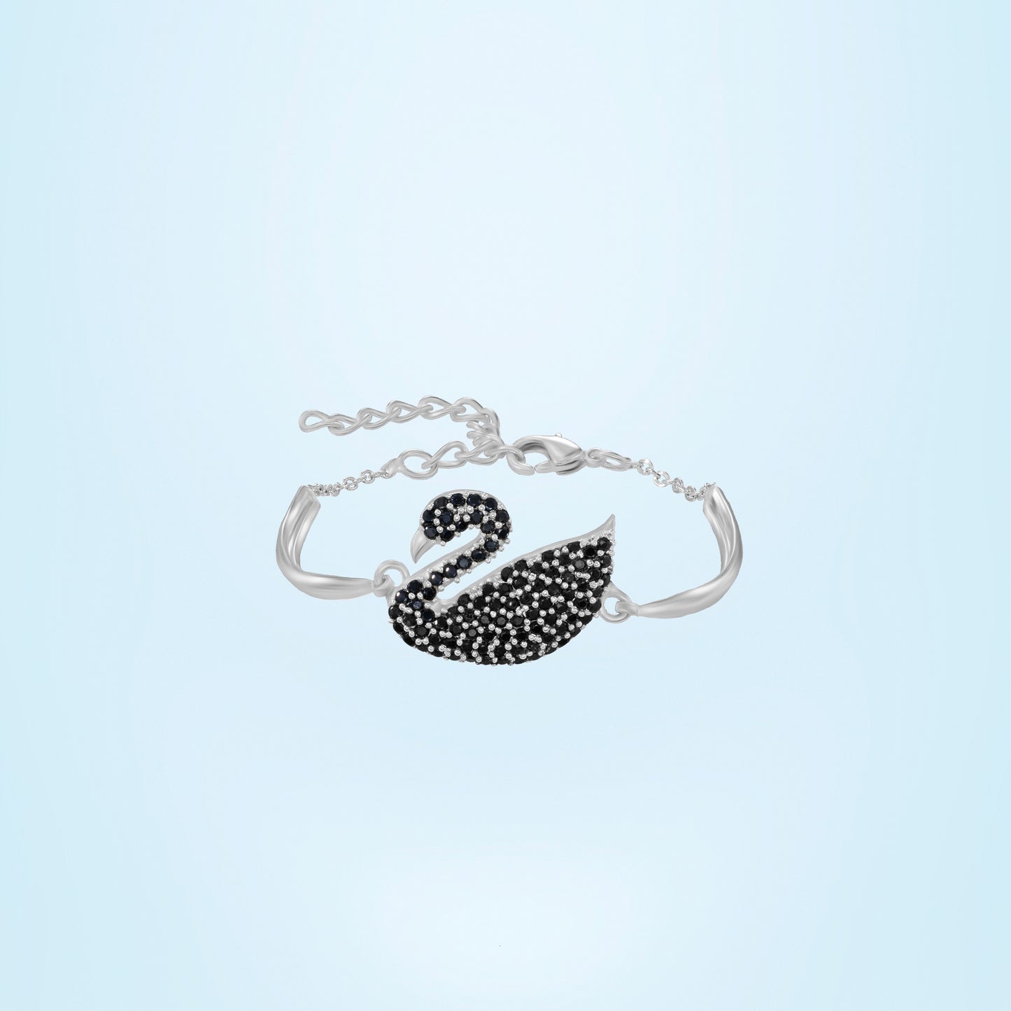 silver bracelet with a swan on it