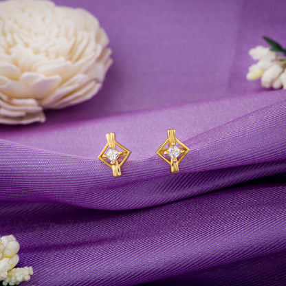 Pair of Golden Earrings with a Diamond