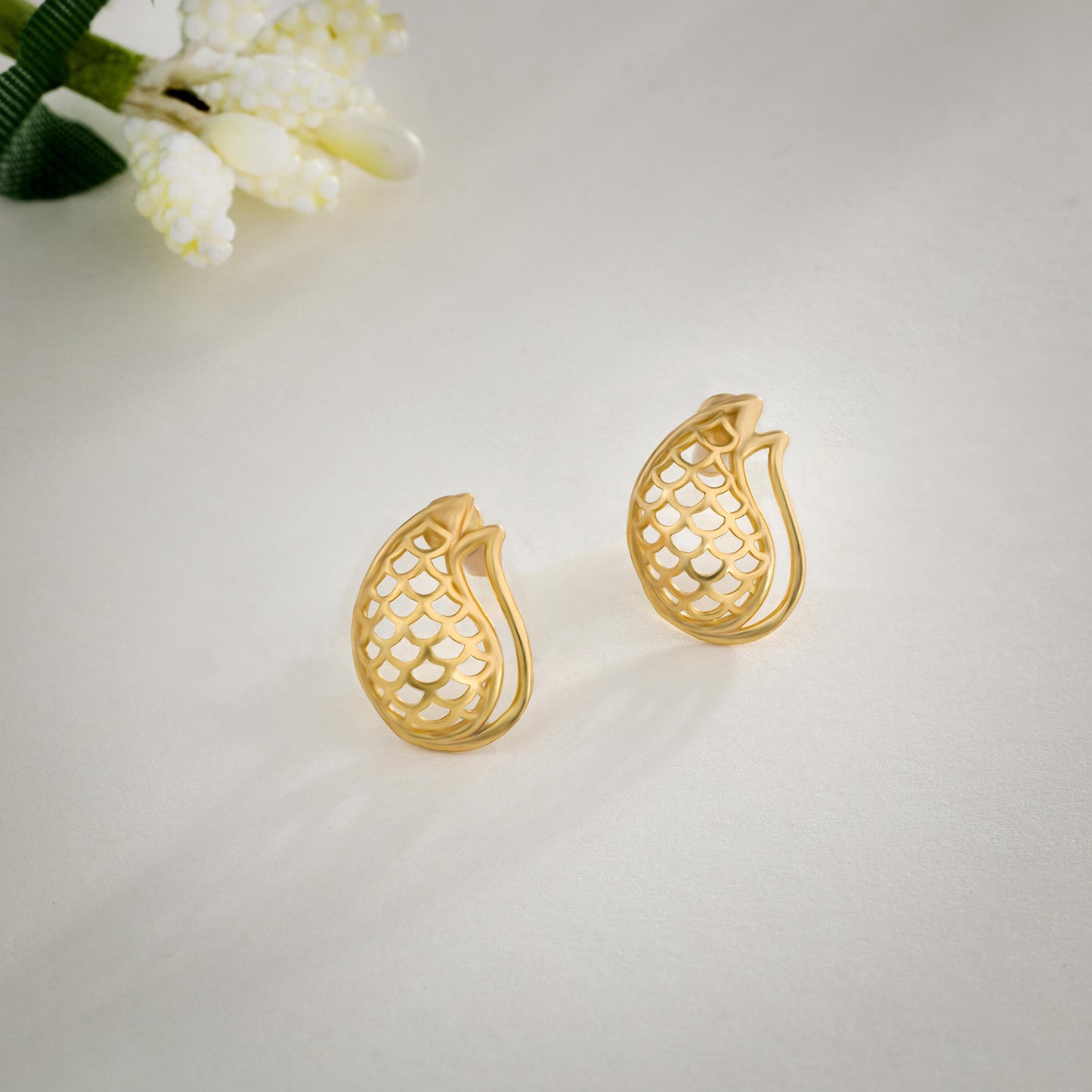 pair of golden pine earrings