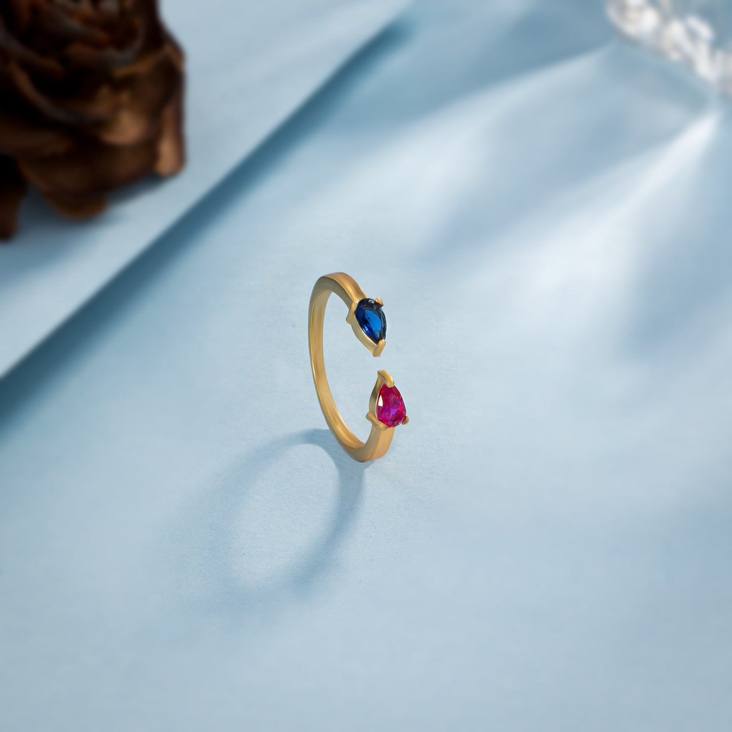 golden ring with a stone and a diamond