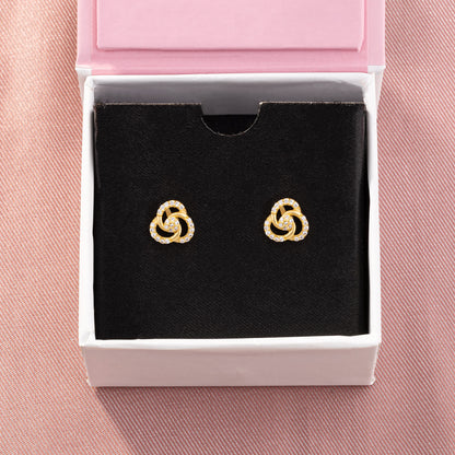 Pair of Golden and diamond earrings