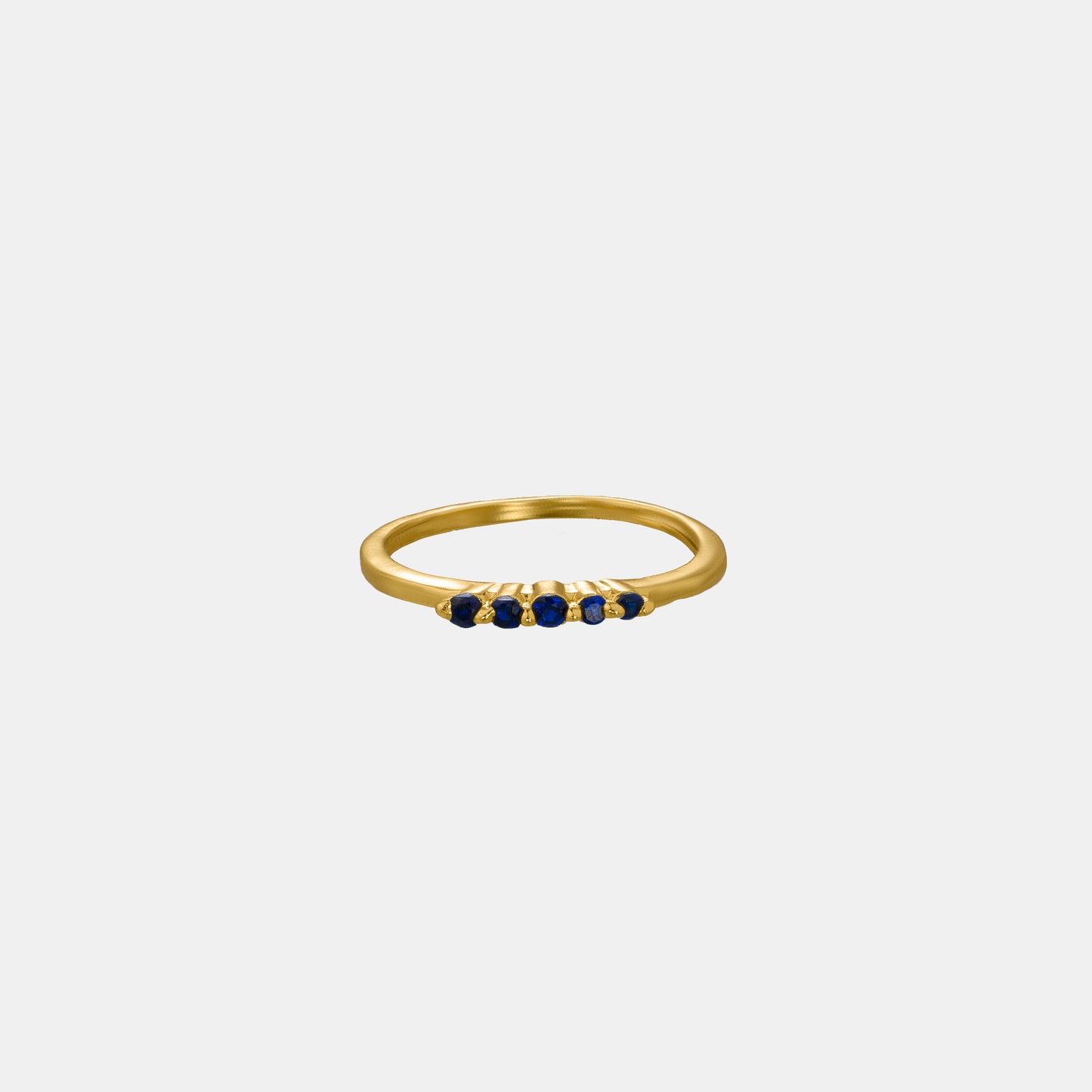 golden ring with blue sapphire stones