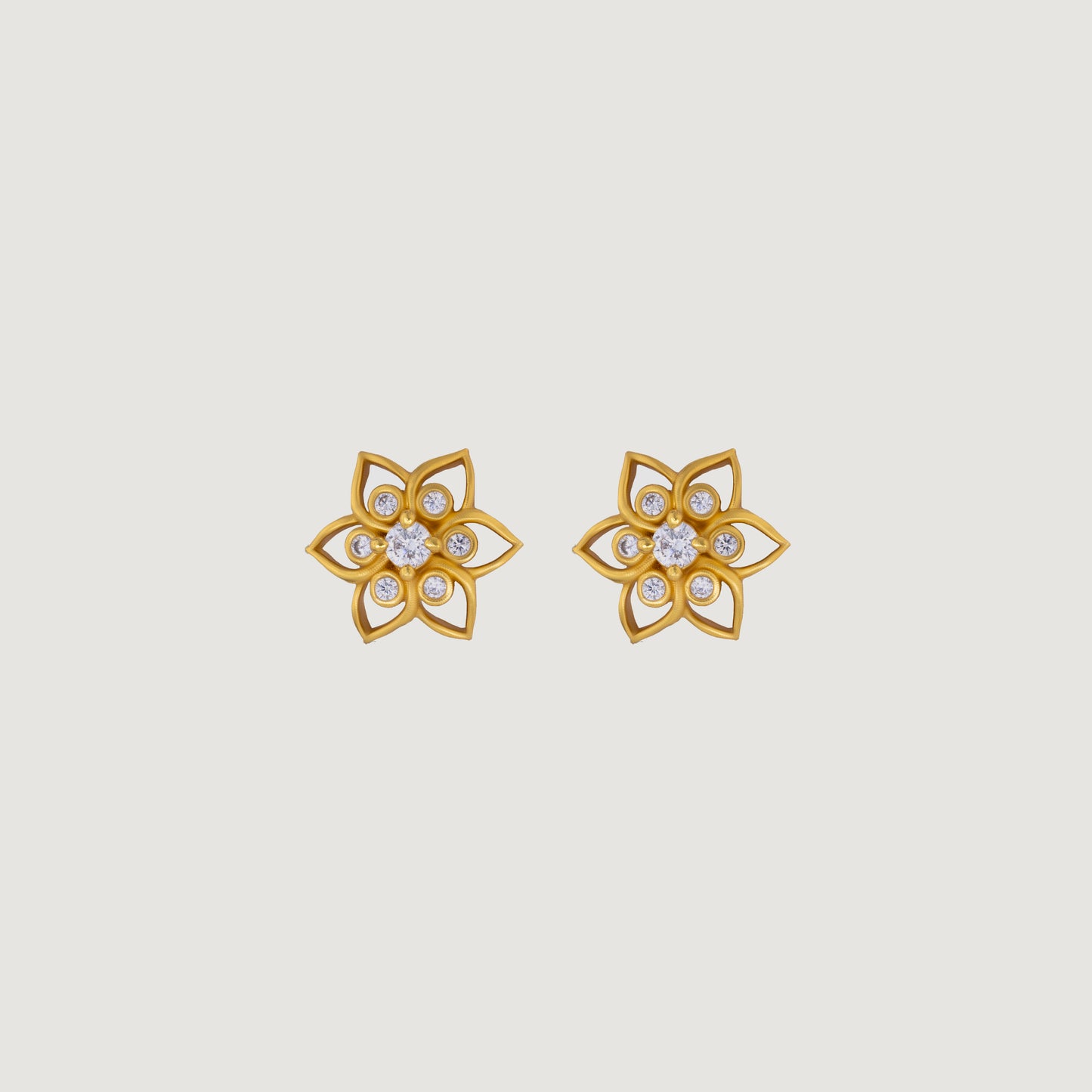 white golden bloom studs