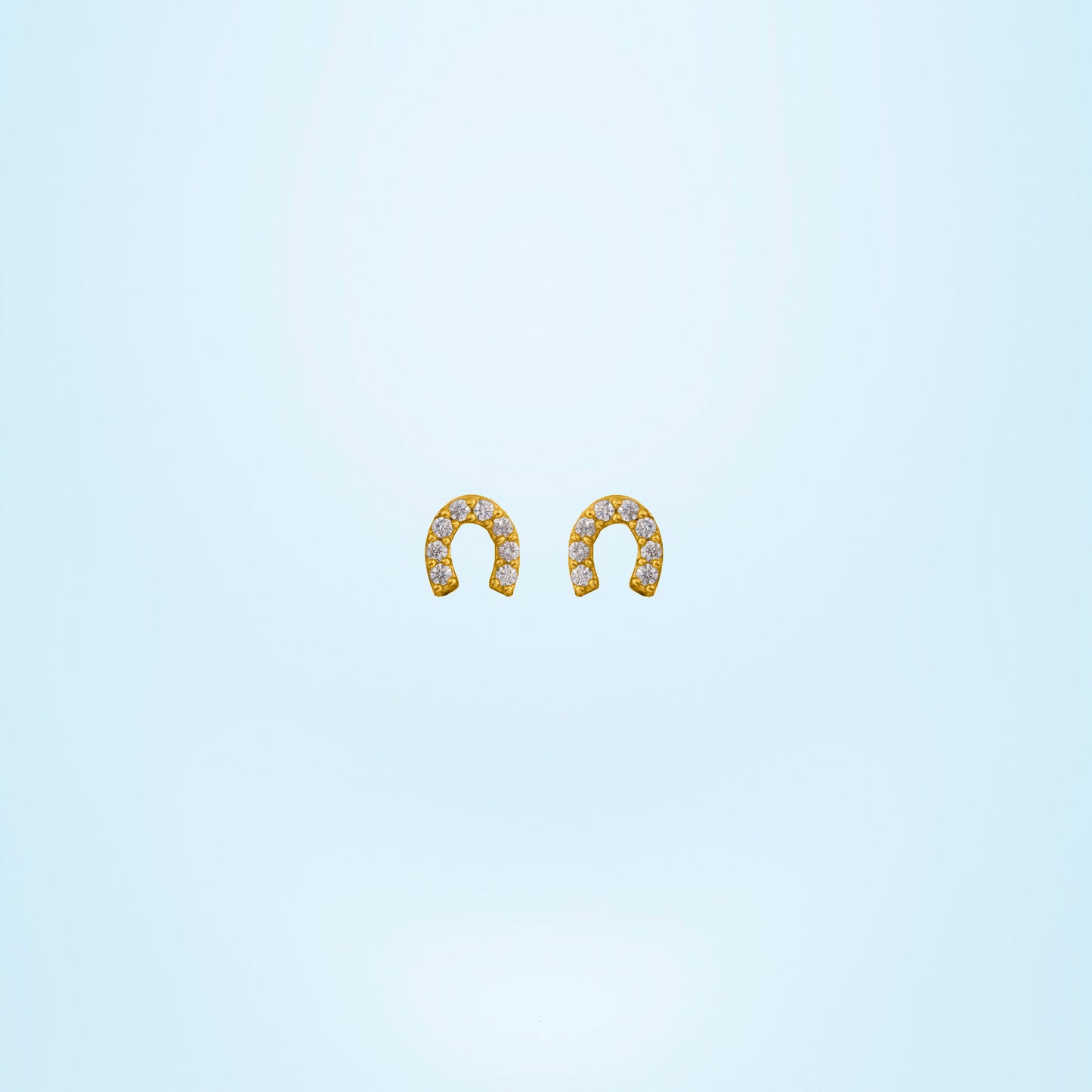 pair of golden earrings with diamonds