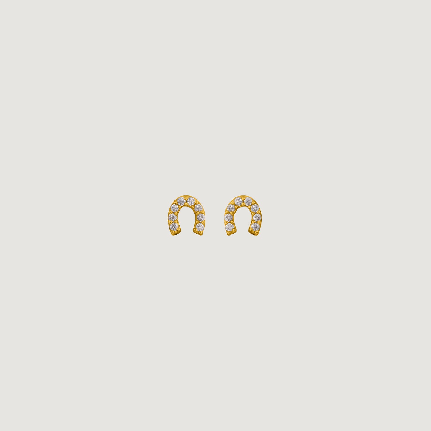 pair of golden earrings with diamonds