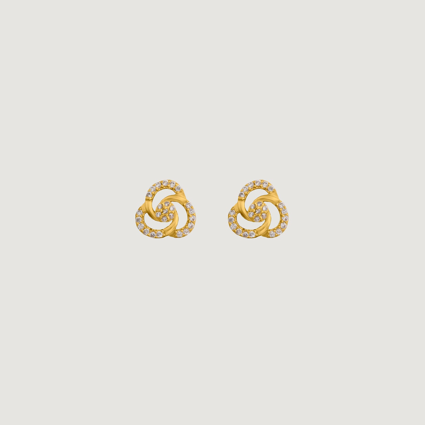 pair of golden and diamond earrings