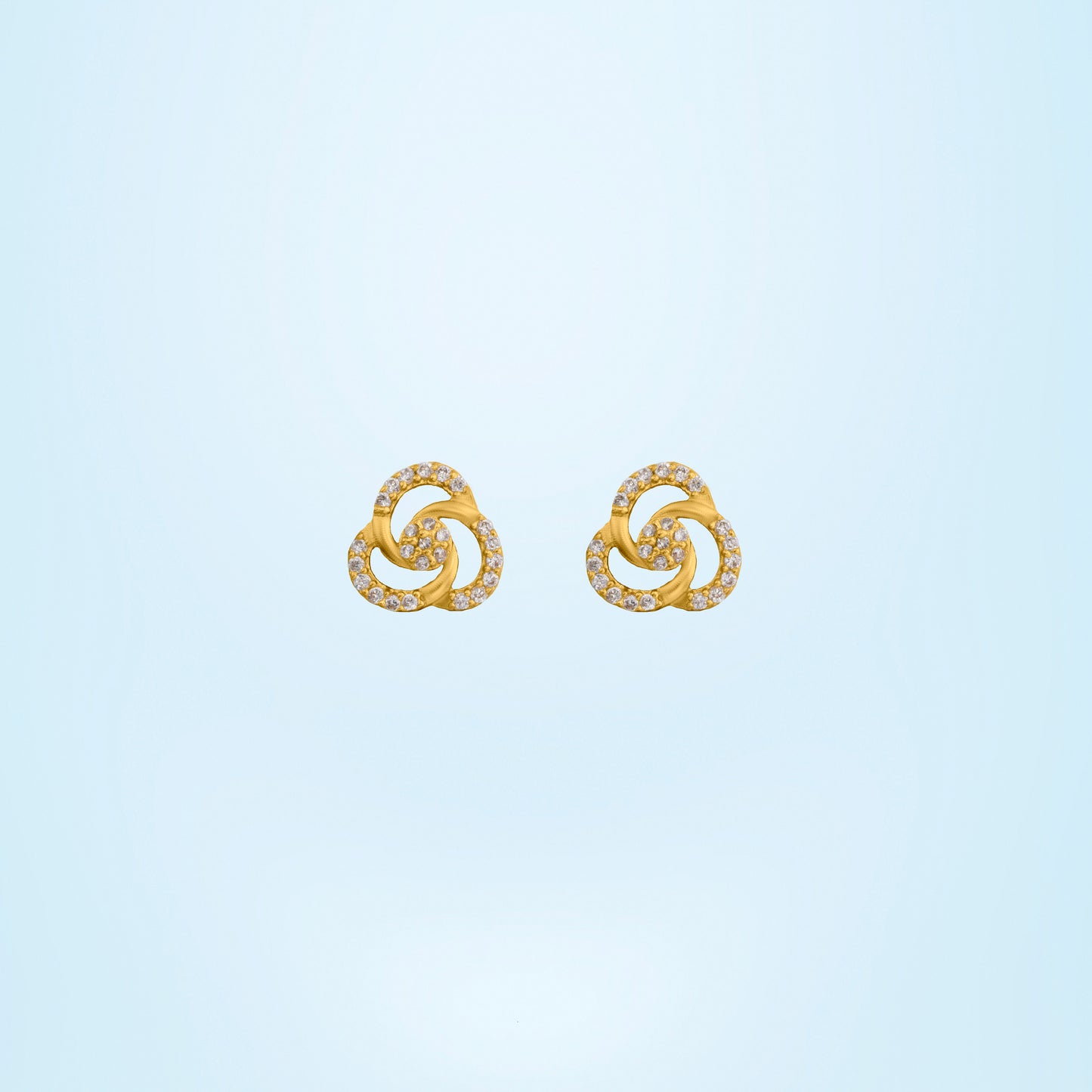 pair of golden and diamond earrings