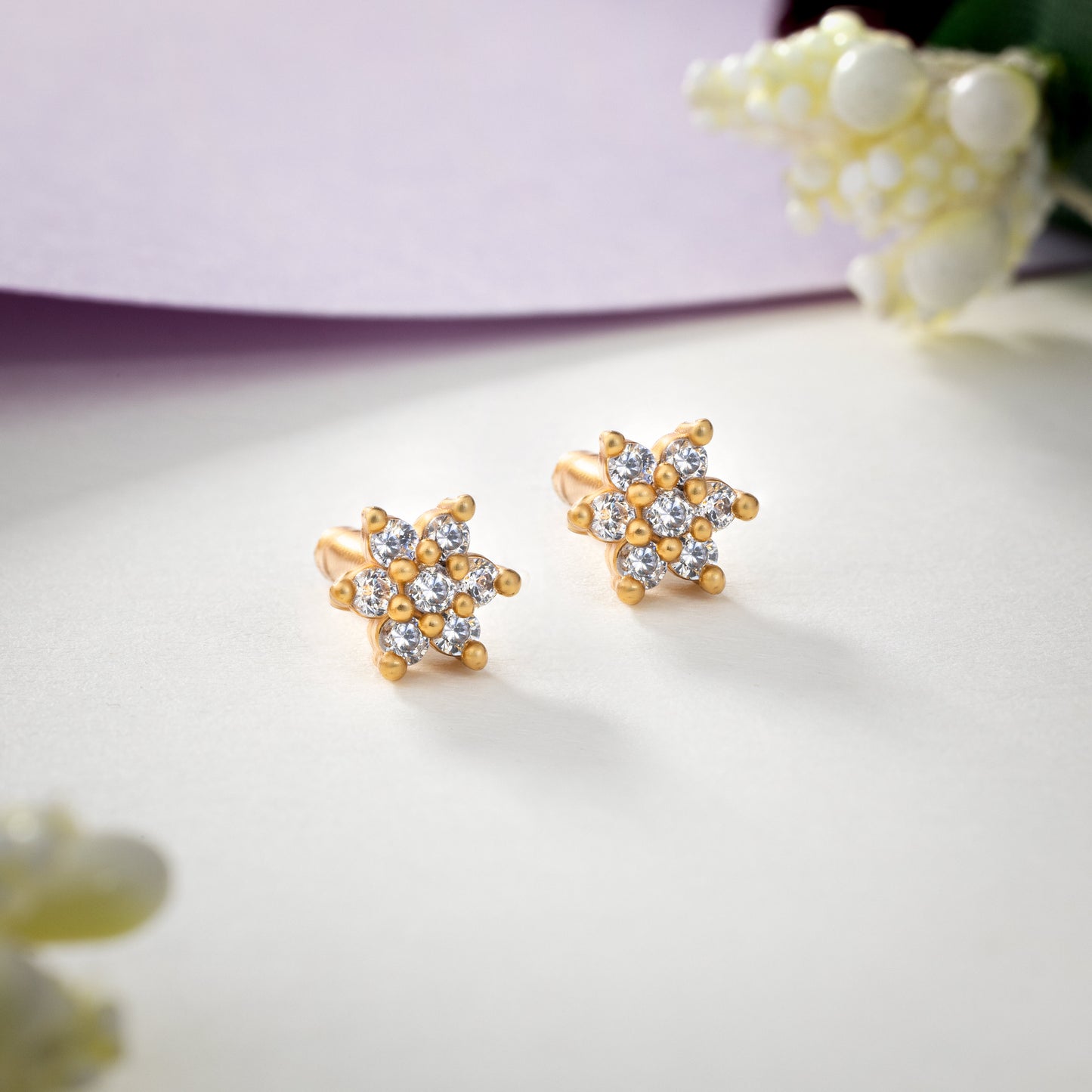 pair of white sapphire earrings