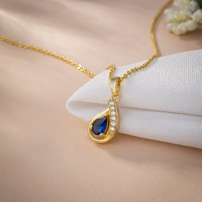 Golden Necklace with a Stone Pendant