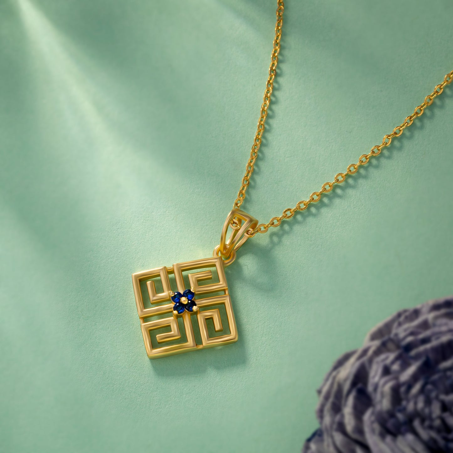 blue eternal maze pendant