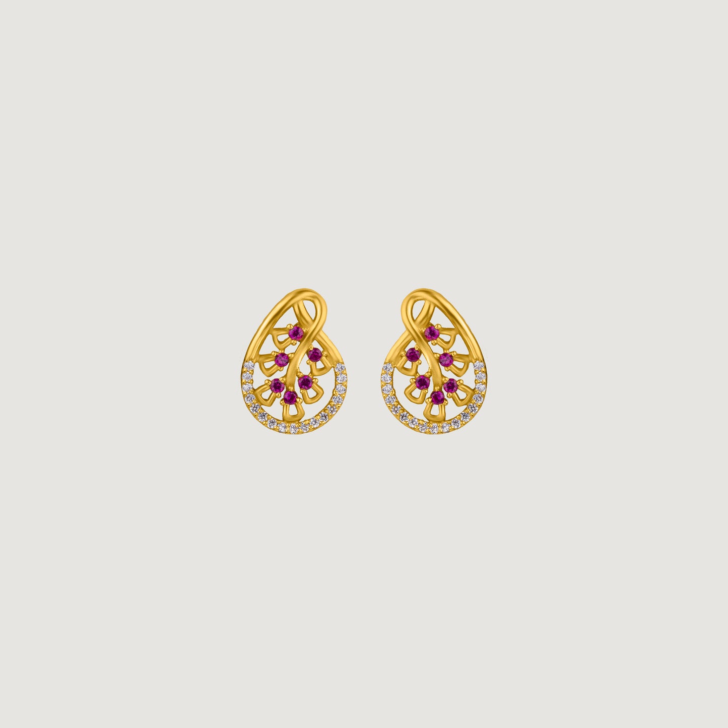 pair of golden earrings with ruby and diamonds