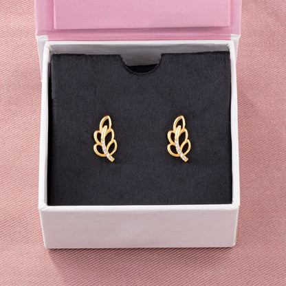 Pair of Golden Earrings with a Single Diamond