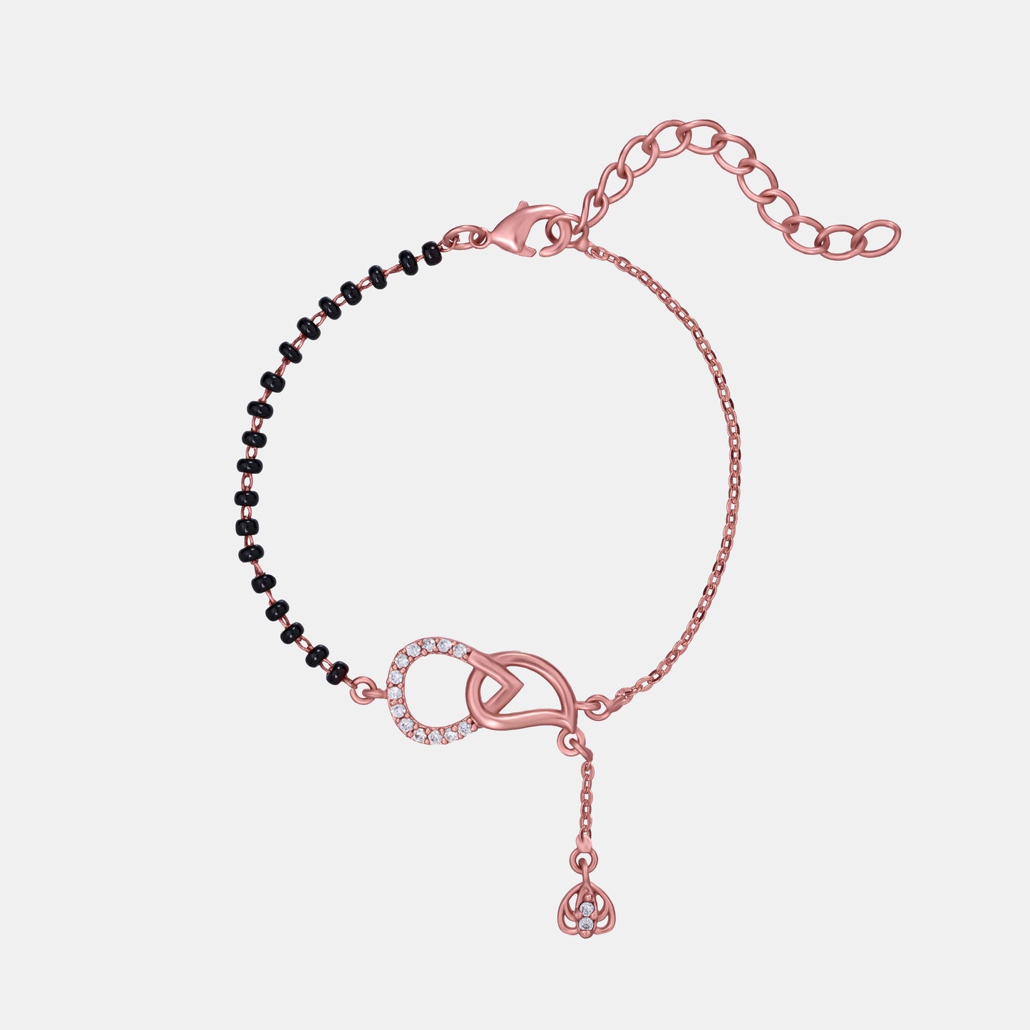 bracelet with a heart charm and a black bea