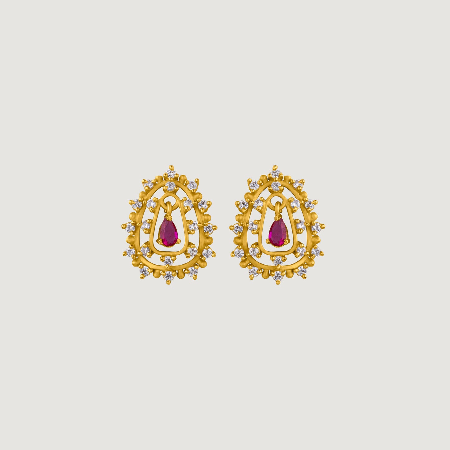 red sapphire halo stud