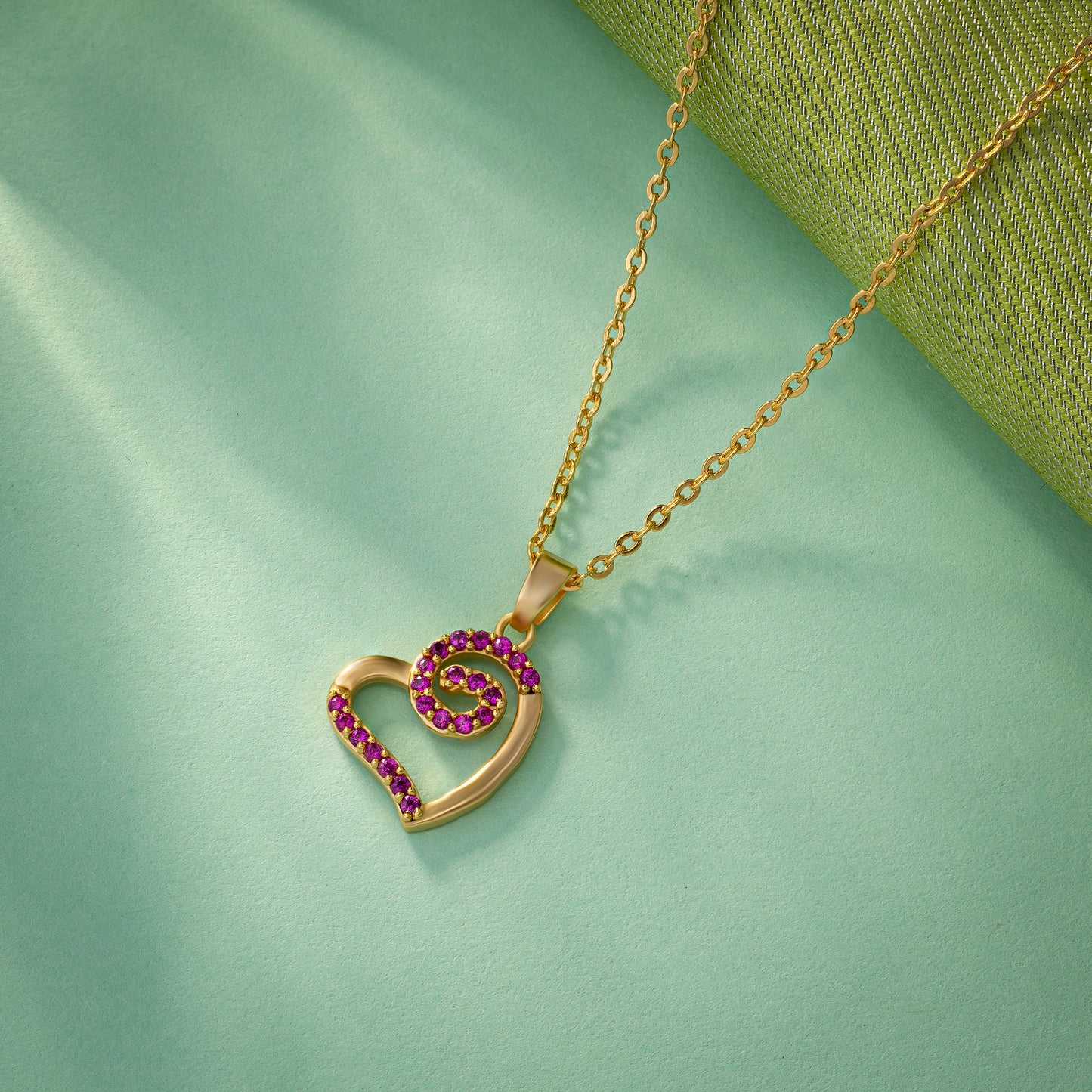 golden heart pendant with diamonds