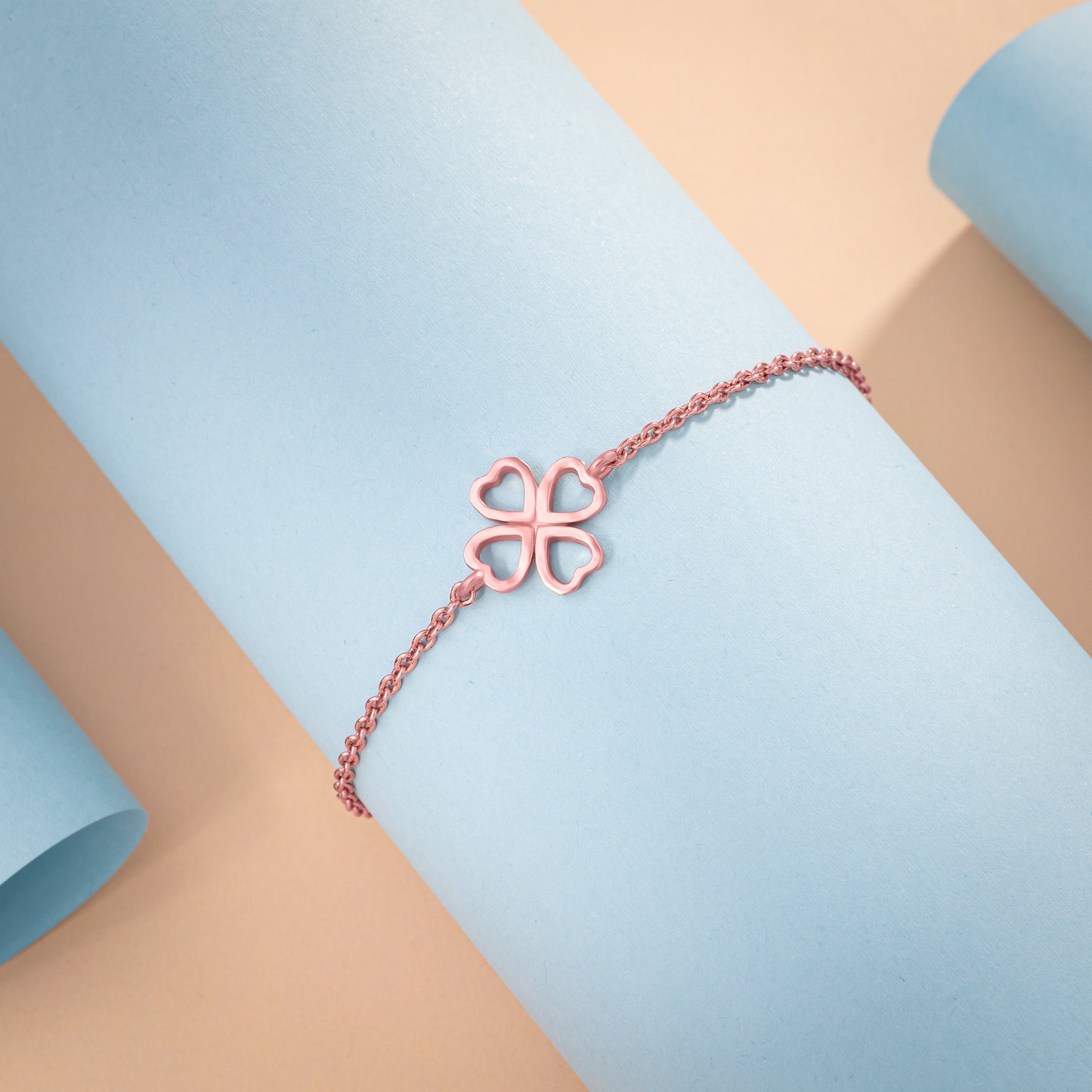 rose gold bracelet with a heart charm