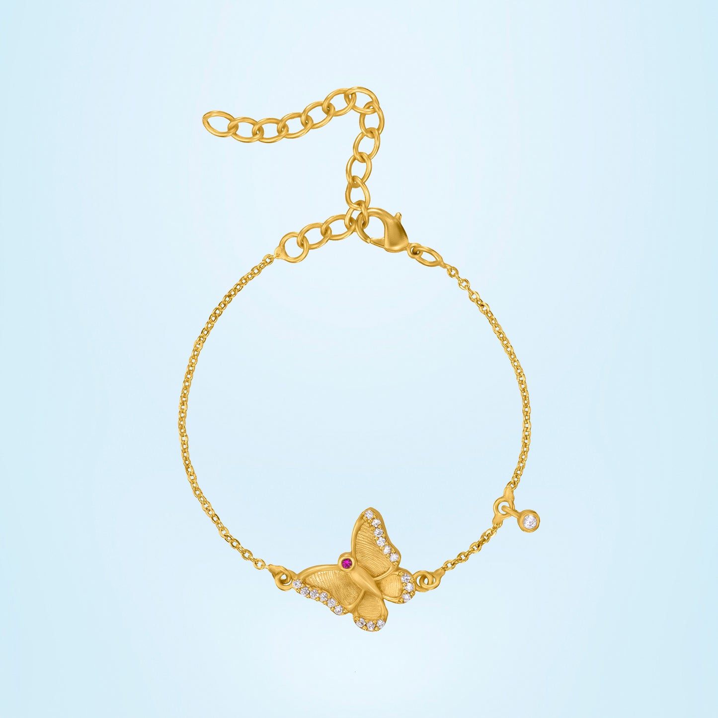 golden bracelet with a butterfly charm