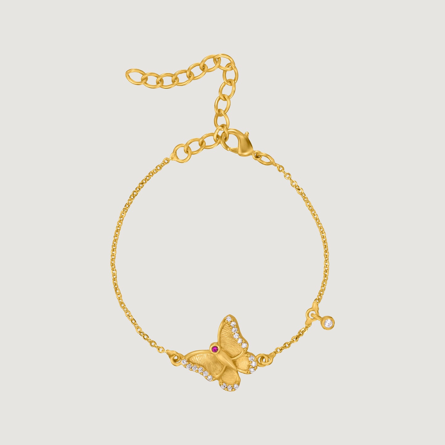 golden bracelet with a butterfly charm