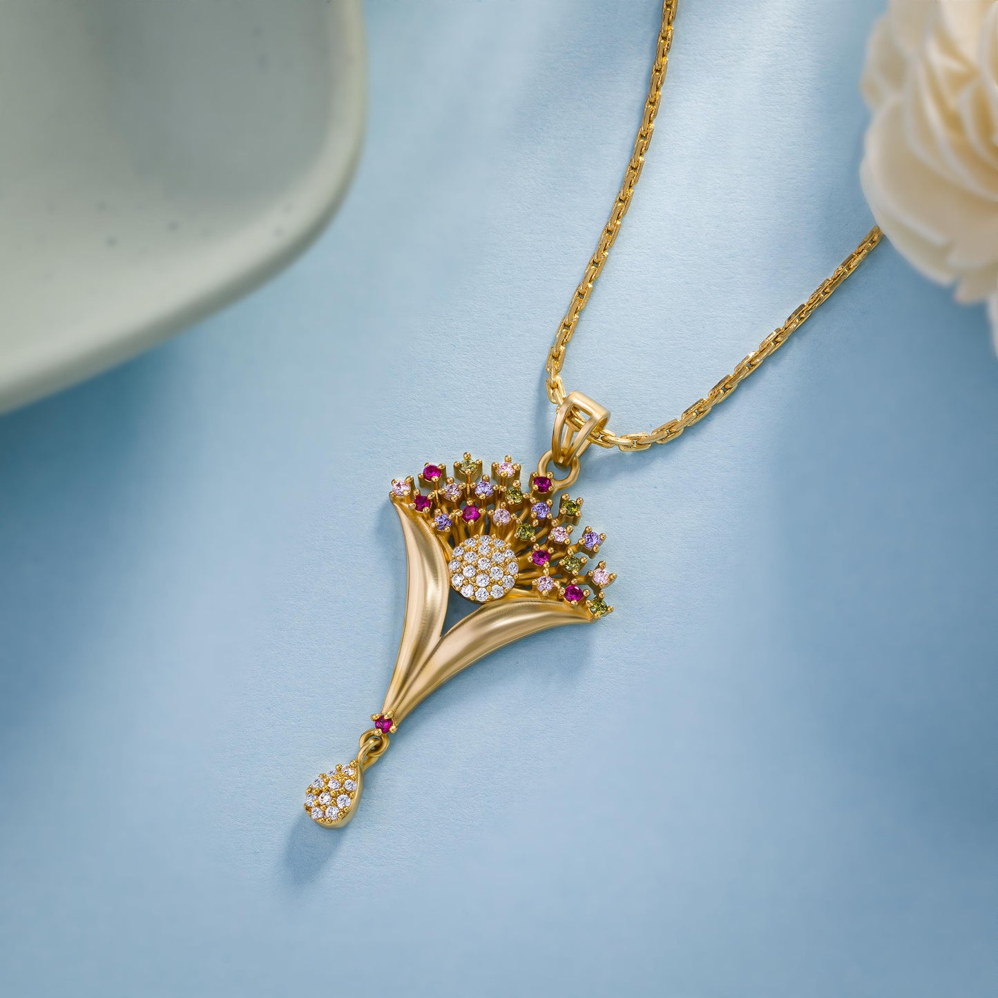 golden necklace with intricate flower design