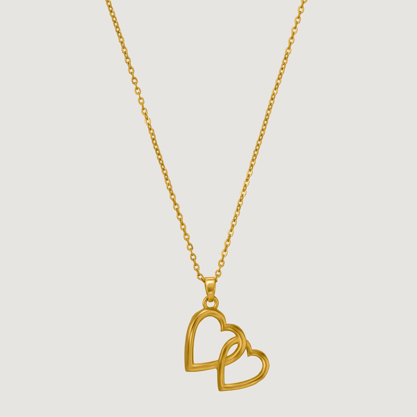 golden heart pendant with a chain