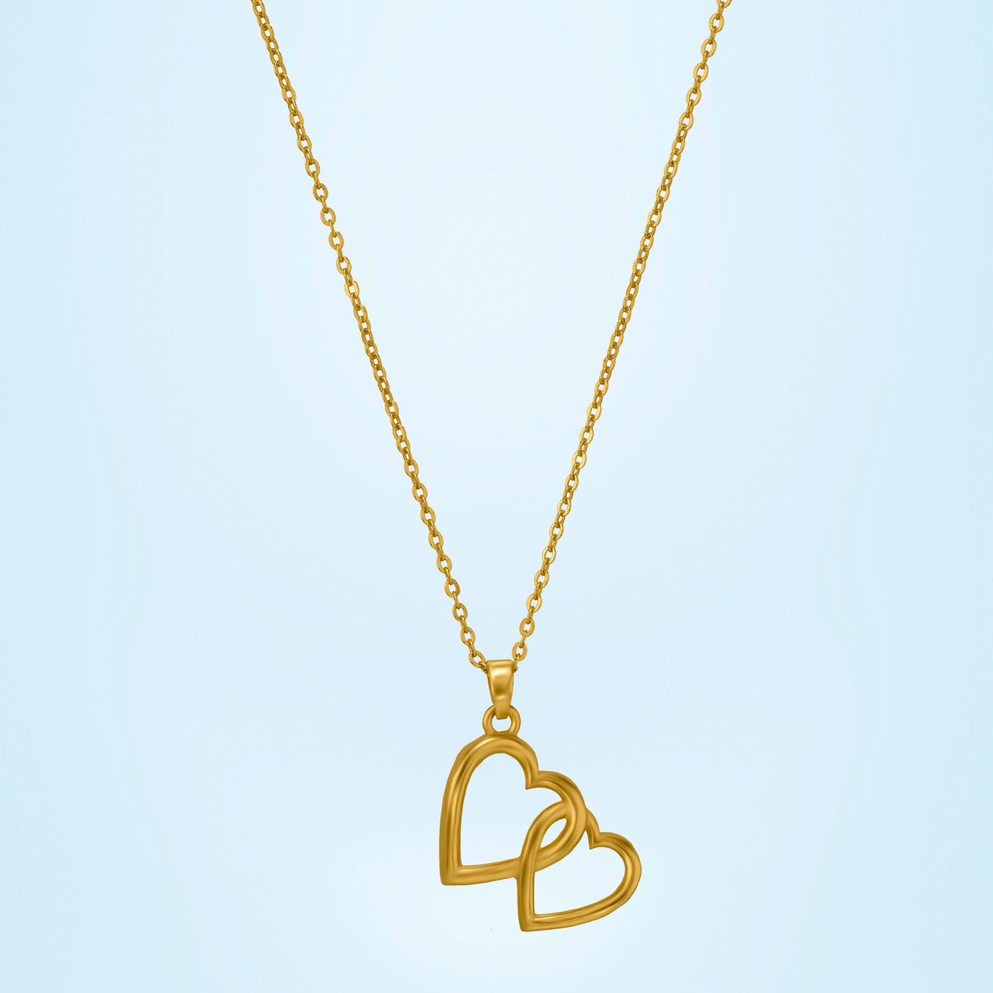 golden heart pendant with a chain